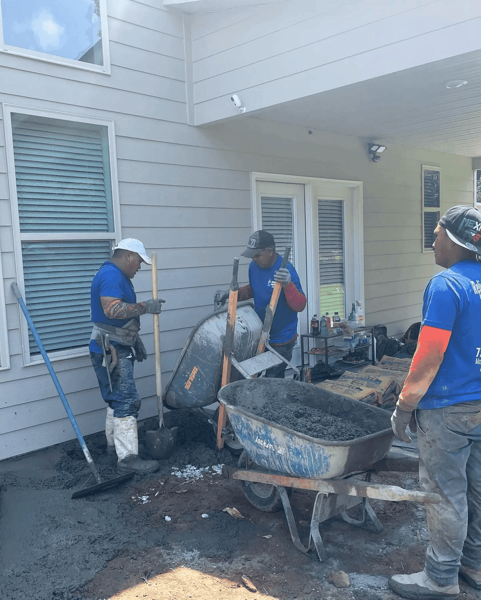 Concrete repair crew working on an Atlanta driveway